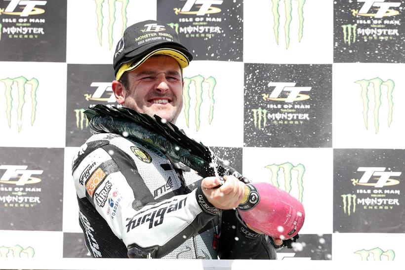 Michael Dunlop celebrates winning the 2nd Supersport race at the Isle of Man TT - Photo by Stephen Davison