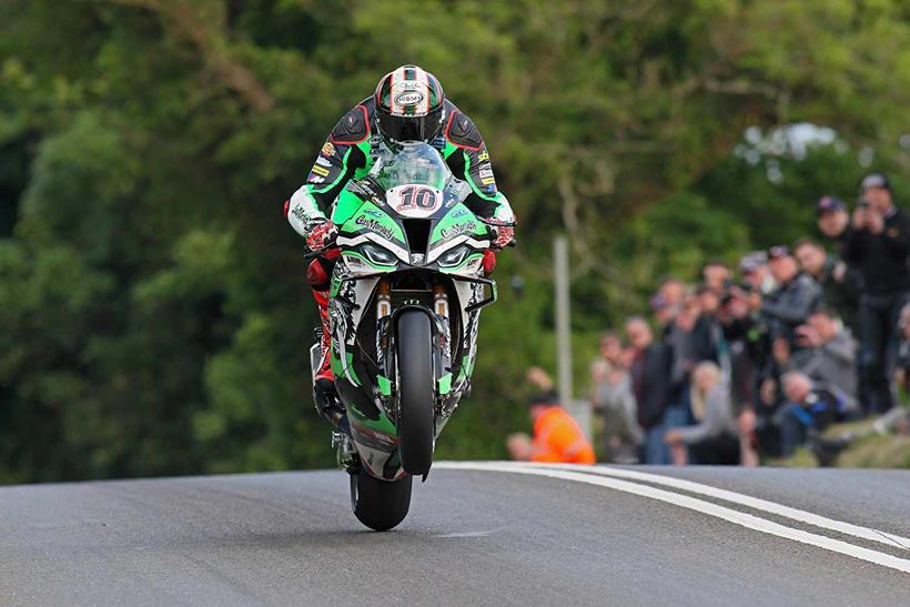 Peter Hickman over Crosby Jump on his Gas Monkey by FHO Racing BMW during Thursday's practice session