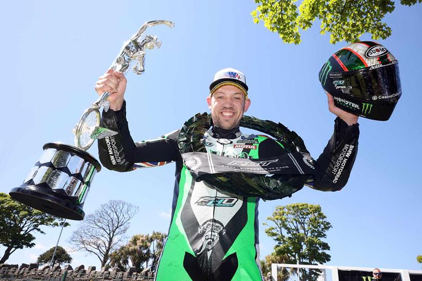 Peter Hickman (FHO BMW Racing) celebrates winning the Superbike TT on Saturday afternoon.