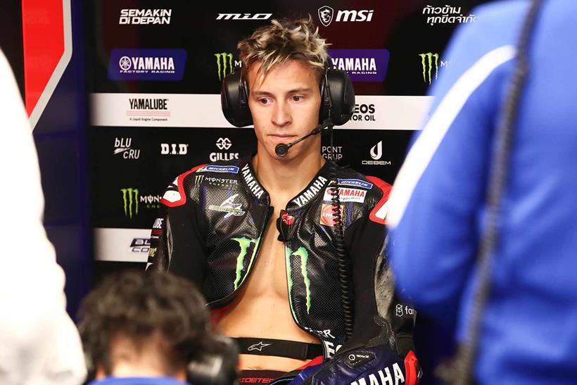 Fabio Quartararo reflecting on his day in the Yamaha garage