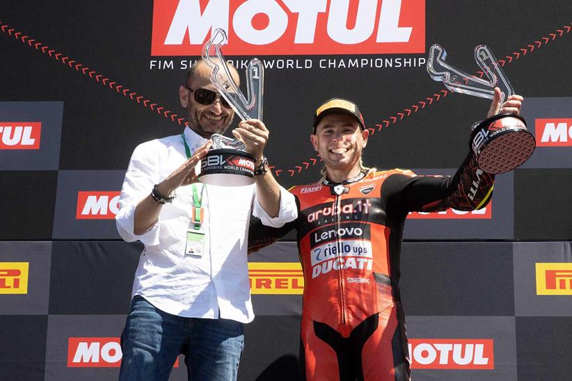 Alvaro Bautista and Ducati CEO Claudio Domenicali on the podium at Misano