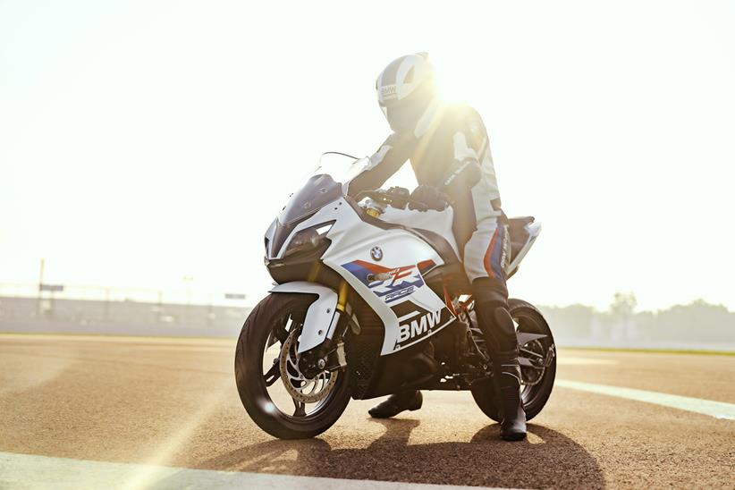 BMW G310RR in white with red and blue decals