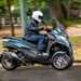 Piaggio MP3 530 hpe Exclusive riding shot side on
