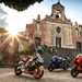 Aprilia RS 660, Yamaha R7 and Honda CBR650R in church square in Sicily