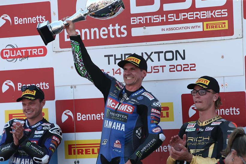 Jason O'Halloran celebrates his win on the podium at Thruxton