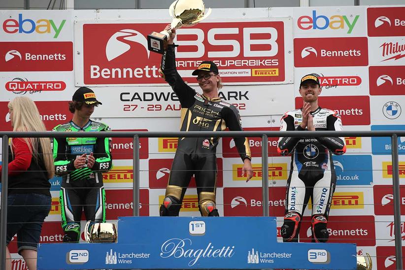 Bradley Ray celebrates victory alongside Rory Skinner and Danny Buchan