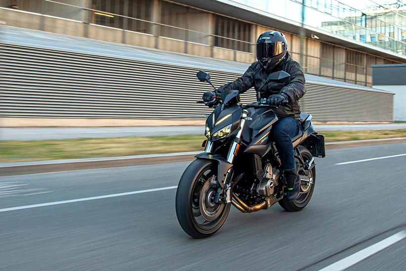 QJMotor SRK 700 being ridden on a track