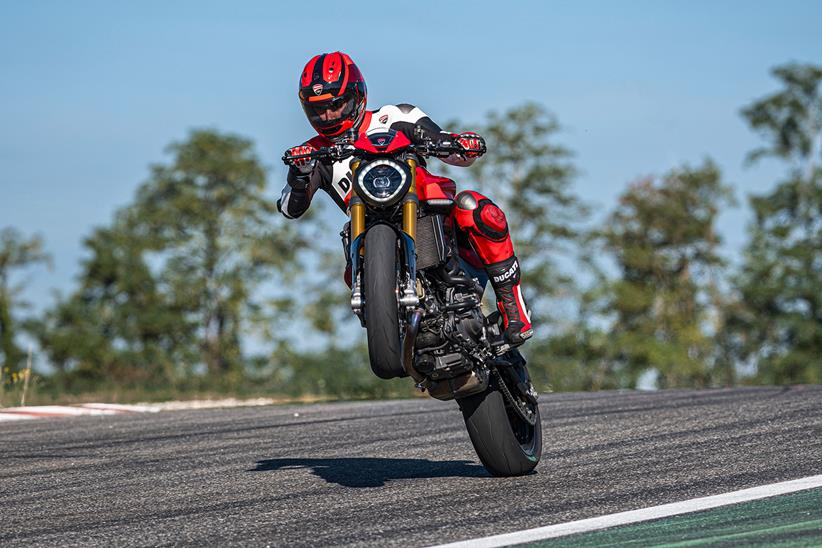 Popping a wheelie on the Ducati Monster SP