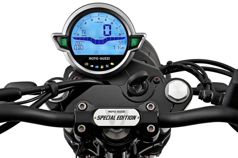 The large speedometer dominates the rider's view with a handlebar mounted authenticating plaque