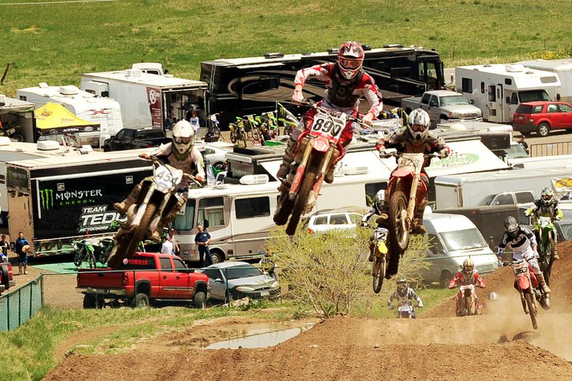 Racers compete at a motocross event hosted by Loretta Lynn