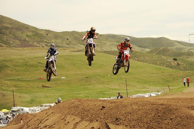 Motocross racers in mid-air