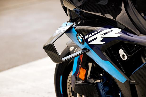 Carbon-clad corner carver: BMW ready up for 2023 WSB season with latest  M1000RR draped in aero upgrades | MCN