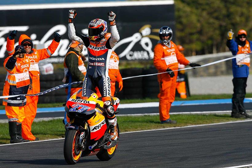 Casey Stoner celebrates his 2011 title win for Repsol Honda at Phillip Island