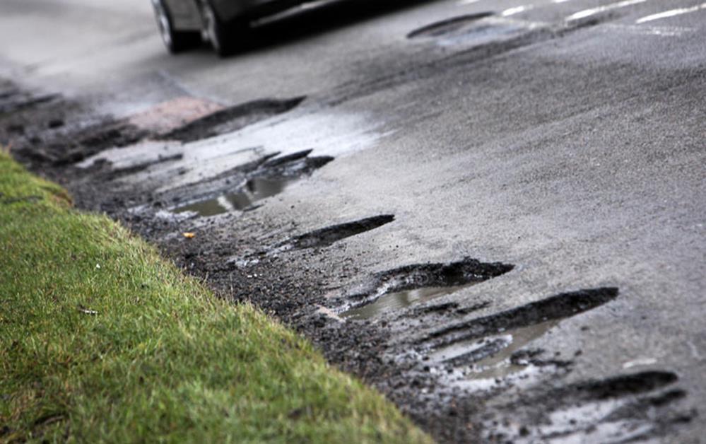 Road maintenance continues to fall as UK roads crumble