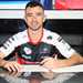 Glenn Irwin signs the paperwork ahead of his switch to PBM Ducati