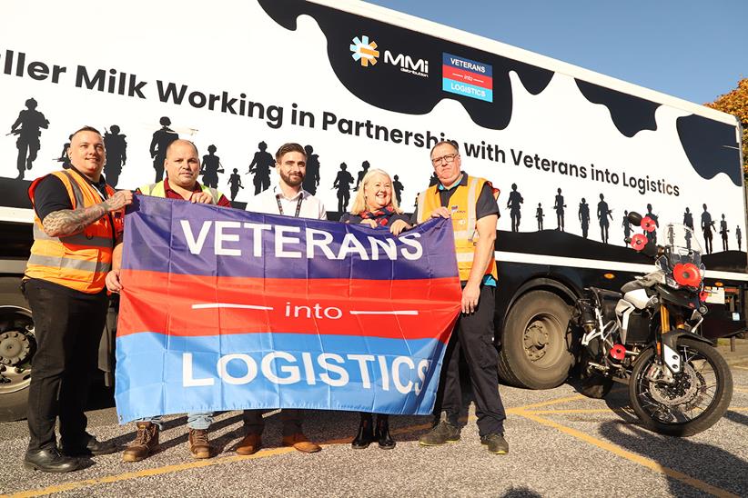 (L to R), Jayne Doyle, and right Ring of Red event organiser Netty Kiely (in high vis) against the Veterans into Logistics truck dedicated to Jamie Doyle. Credit Leilah Wright