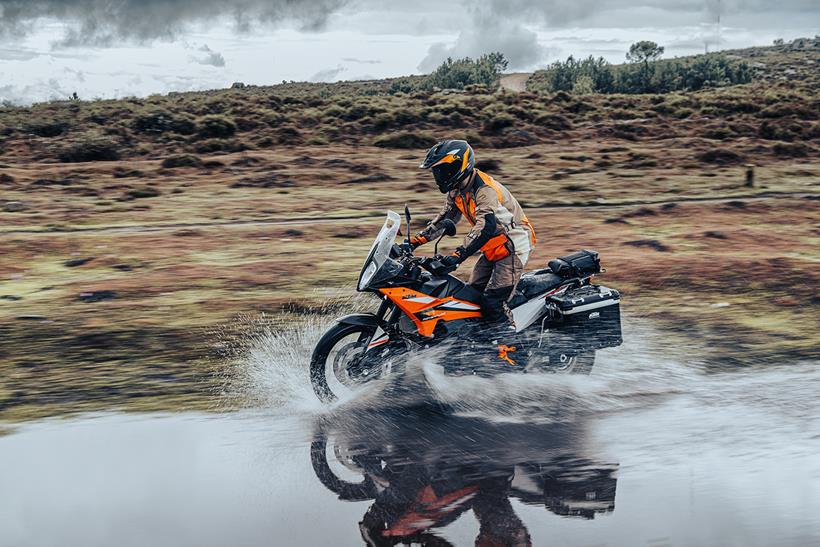 Splashing through the puddles on the 2023 KTM 890 Adventure