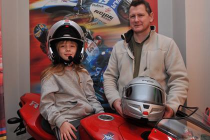 John and Chloe-Ann Mair pose on the Nolan Presidents’ MV F4!