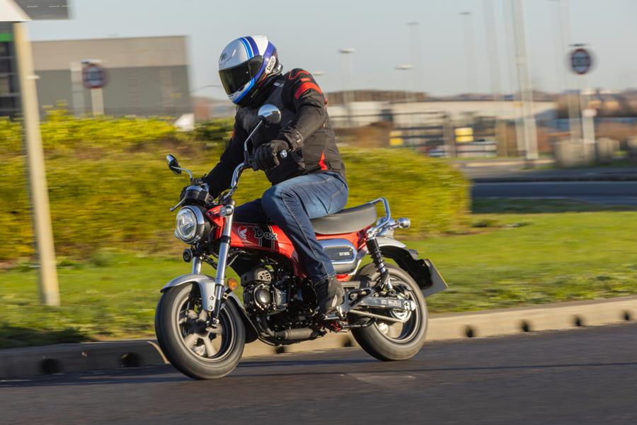 Honda Dax 125 left side on the road