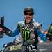 Ken Block posing with an X-Games trophy