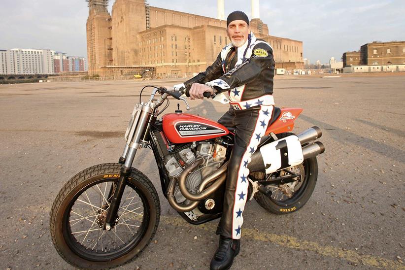 Robbie Knievel sitting on a Harley-Davidson