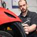 MoT tester checking tyre tread depth