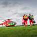 Thames Valley Air Ambulance team walk back to the helicopter