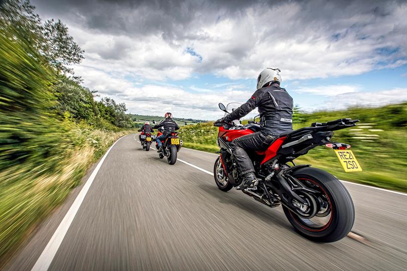 Bikers riding together on the road in the UK