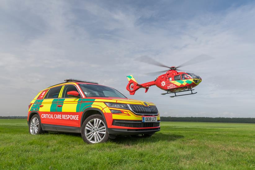 Thames Valley Air Ambulance helicopter and car