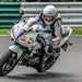 Claire Lomas riding a Suzuki SV650 at Cadwell Park