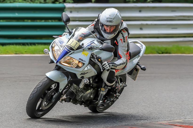 Claire Lomas riding a Suzuki SV650 at Cadwell Park