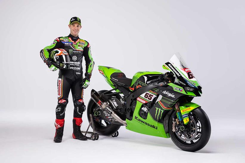 Jonathan Rea stands next to his 2023 Kawasaki ZX-10RR