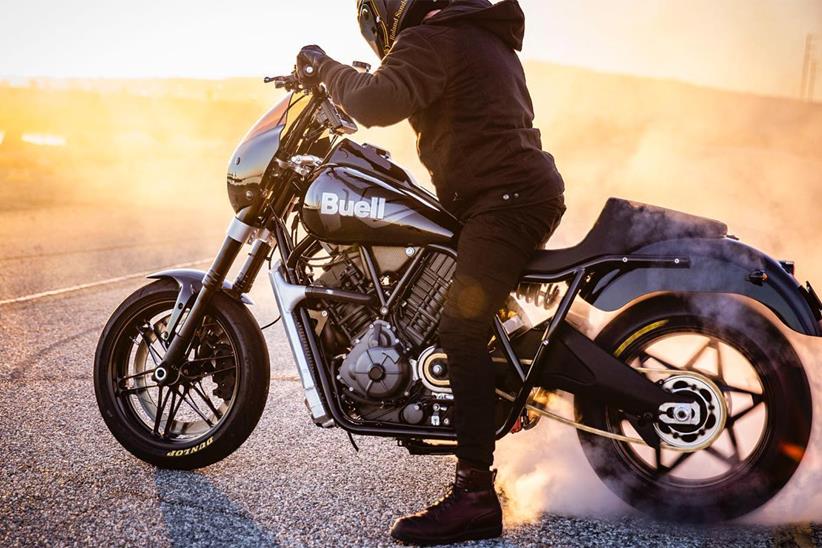 A rider sits on the Buell Super Cruiser