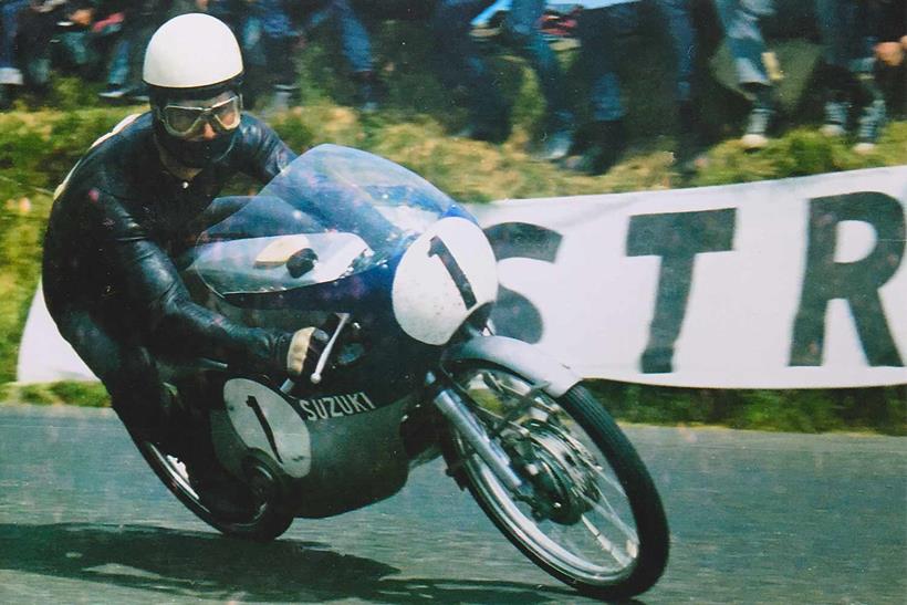 Hans-Georg Anscheidt in action on the 50cc Suzuk in 1966