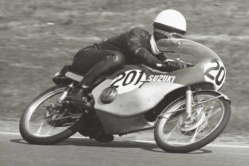 Hans-Georg Anscheidt in action on the 50cc Suzuk in 1966