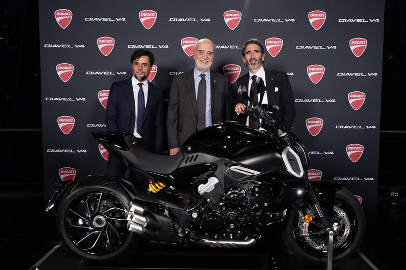 Ducati bosses and Italian dignitaries pose with the Diavel V4