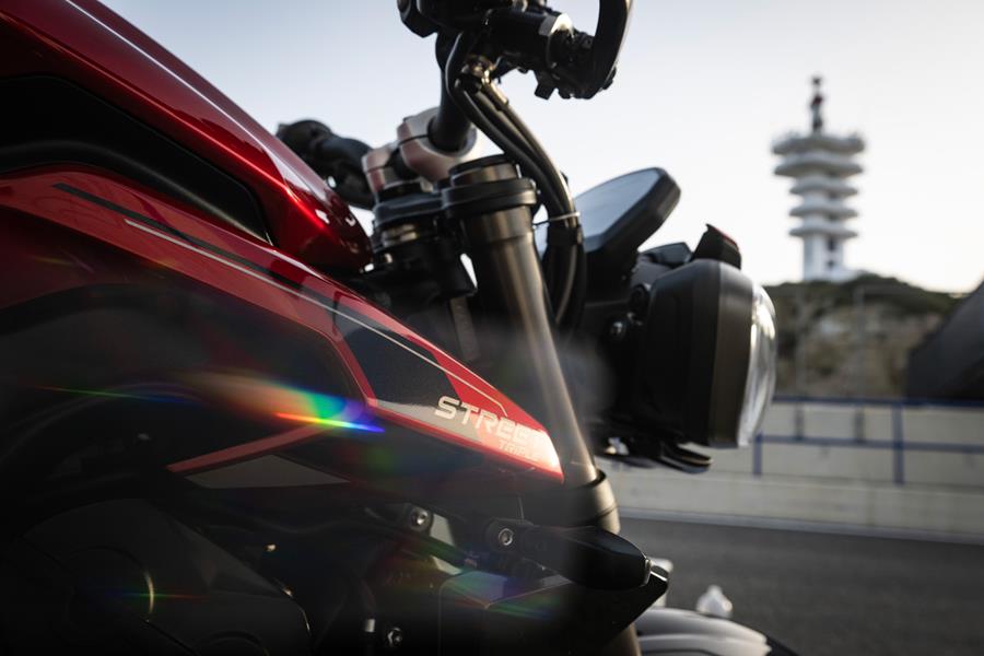 Side view of the Triumph Street Triple 765 RS headlight and fuel tank