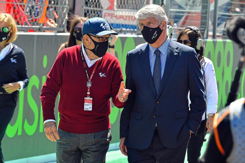 FIM President Jorge Viegas on a MotoGP grid with Carmelo Ezpeleta