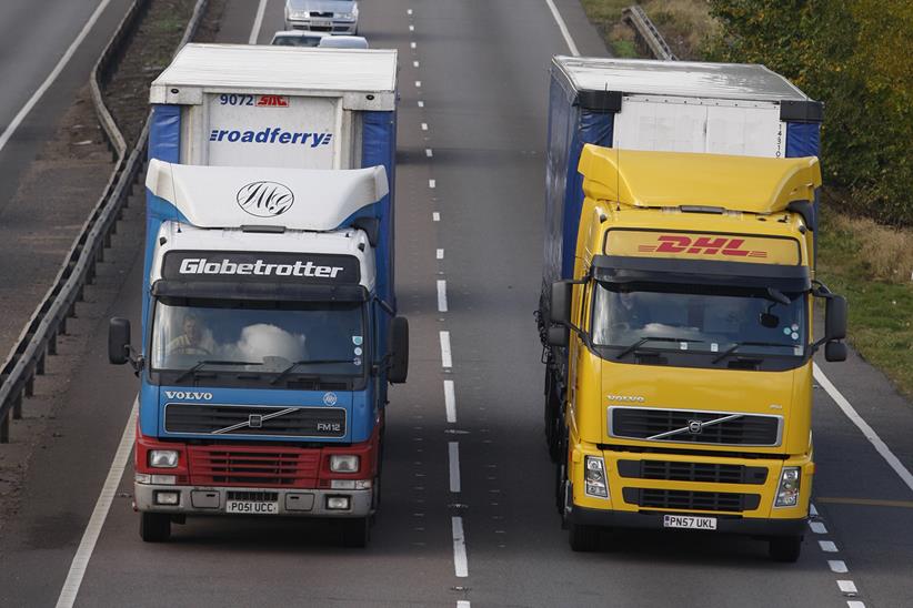 Two HGVs on a dual carriageway