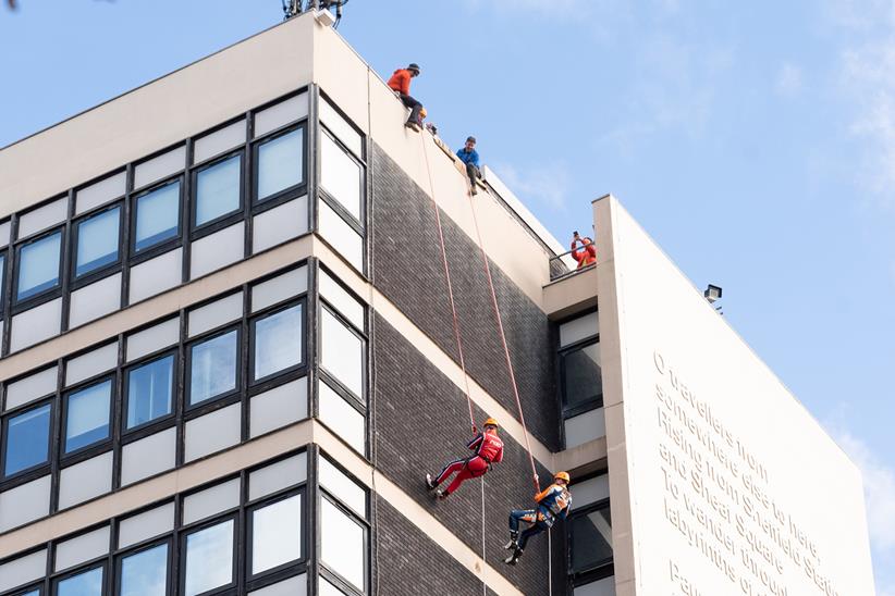 James Toseland abseiling down a Sheffield Hallam University building