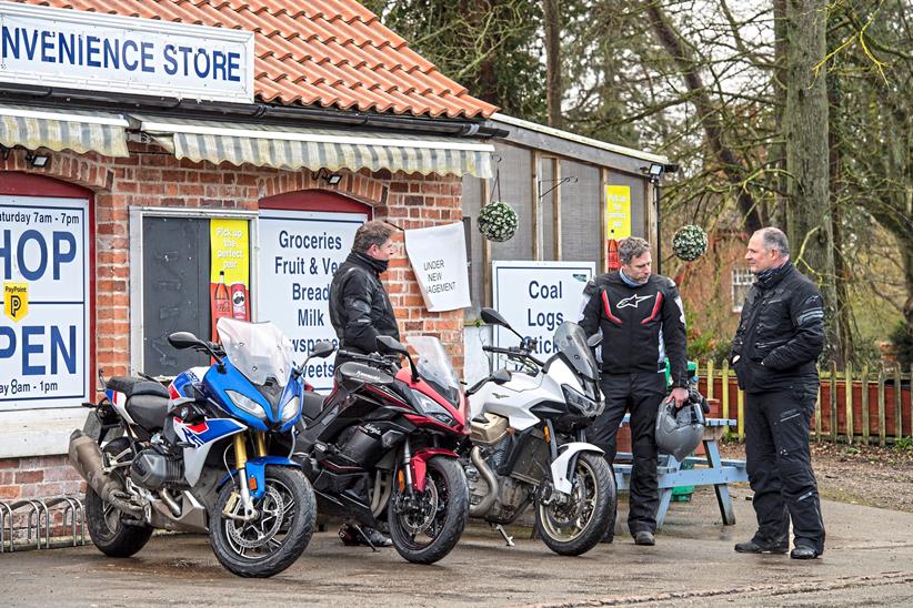 The Moto Guzzi V100 Mandello parked up with the Kawasaki Ninja 1000SX and BMW R1250RS