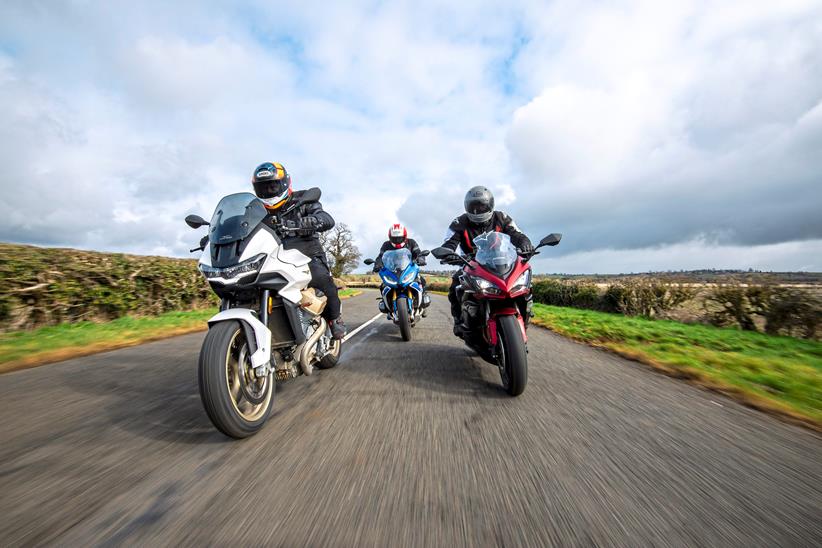 Moto Guzzi V100 Mandello riding on the road with Kawasaki's Ninja 1000SX and BMW R1250RS