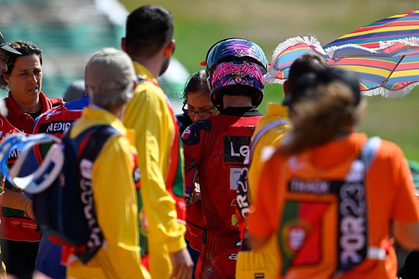 Enea Bastianini walks away from the scene of his Portimao crash