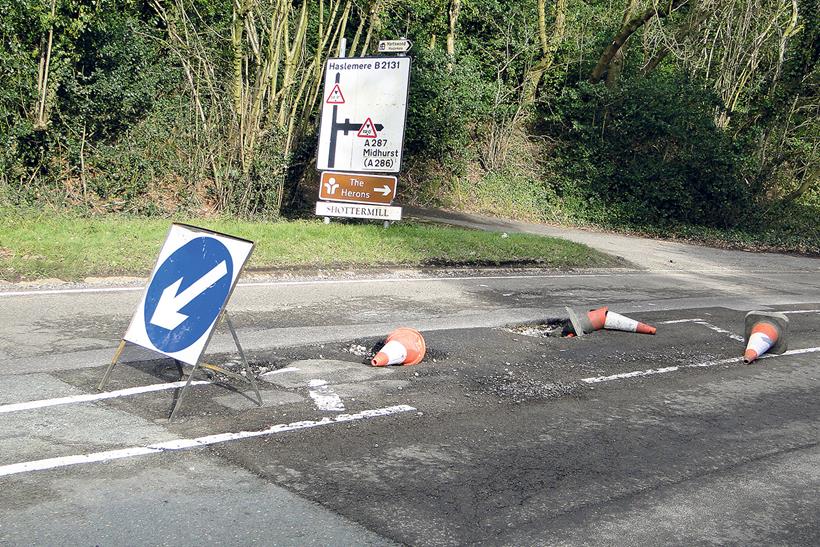 Potholes on a road in the UK