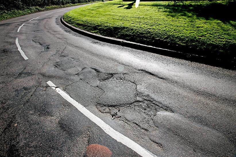 Damaged tarmac on a UK road