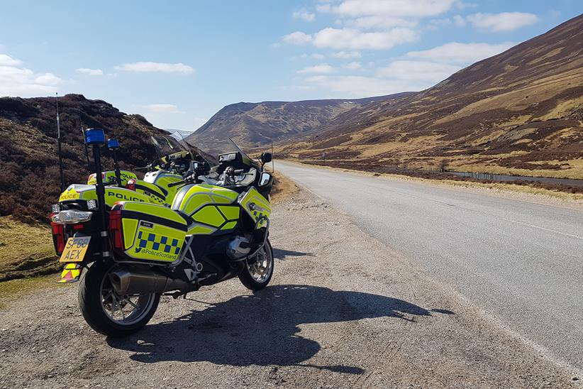 Police bikes parked by a Scottish road