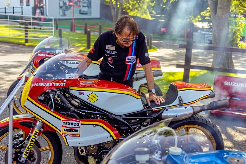 Ex-Barry Sheene bike being warmed up for a run on track at Suzuki Live 2022