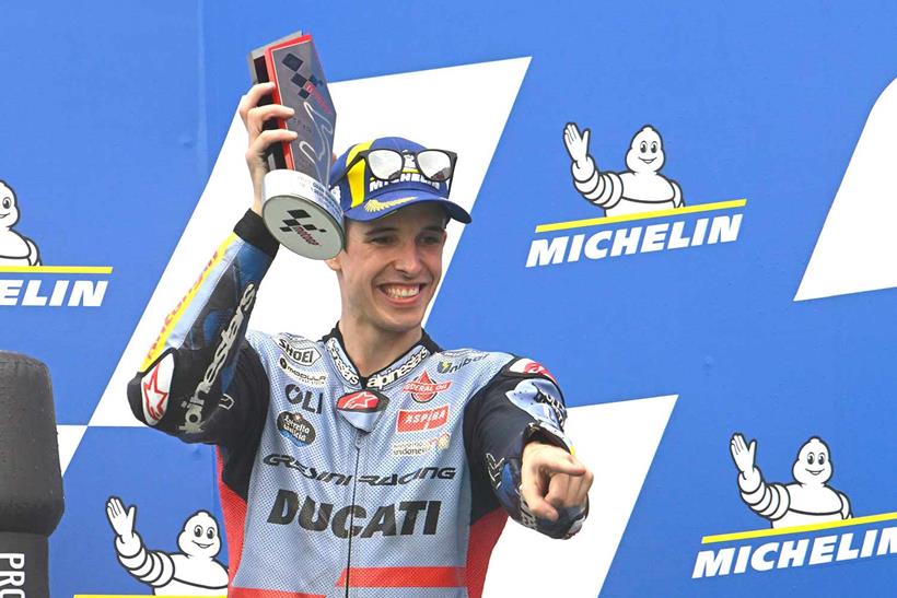 Alex Marquez celebrates on the podium in Argentina