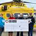 Jude Morris Racing Foundation presents a cheque to the Air Ambulances UK