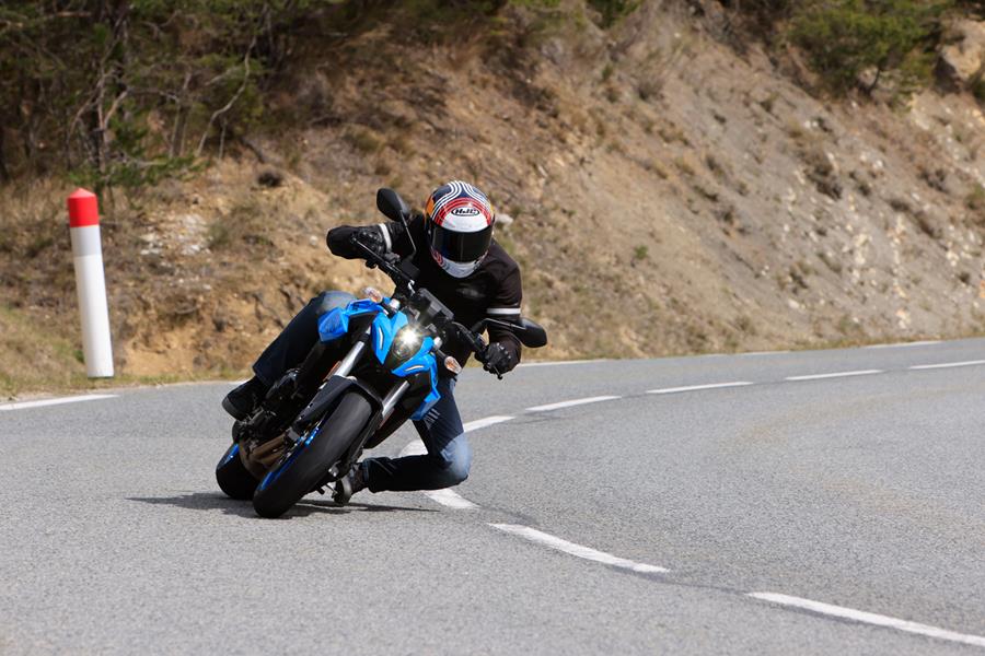 Riding around a bend on the 2023 Suzuki GSX-8S